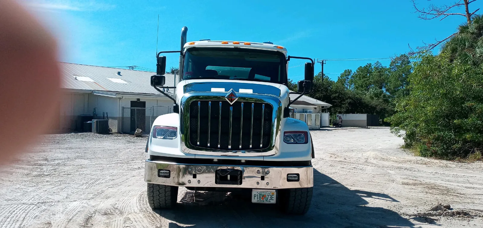A Monty Sanitation truck from the front